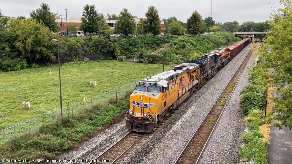 UP 5357 leads WO80 under Mill St. bridge.